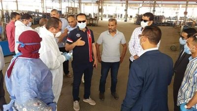 بالصور | تطهير وتعقيم مصنع بوتاجاسكو بسوهاج بعد اكتشاف إصابة أحد العاملين ب